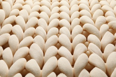 Photo of Chunky knit blankets as background, closeup view