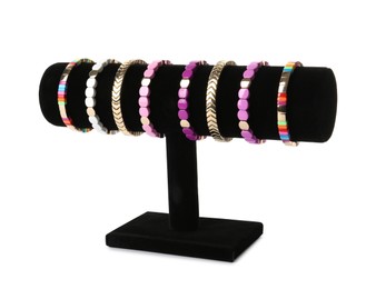 T-bar jewelry stand with stylish bracelets on white background