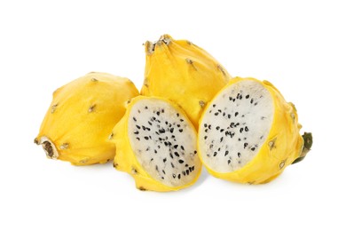 Delicious cut and whole yellow pitahaya fruits on white background