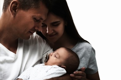 Happy family with their cute baby on white background