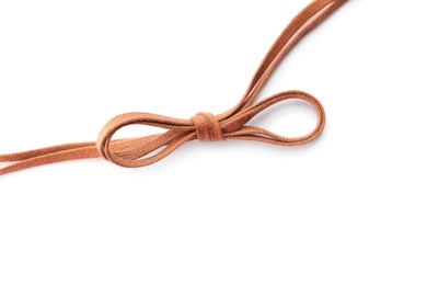 Brown shoe laces tied in bow isolated on white, top view