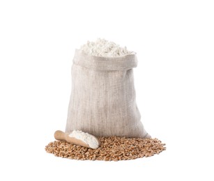 Sack with flour, scoop and grains on white background