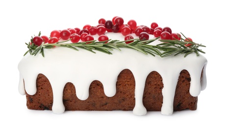 Traditional classic Christmas cake decorated with cranberries and rosemary isolated on white
