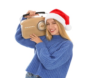 Happy woman with vintage radio on white background. Christmas music