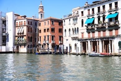VENICE, ITALY - JUNE 13, 2019: Picturesque view of Grand Canal. Grand Canal is most famous channel in city