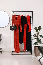 Collection of trendy women's garments in clothing rental salon