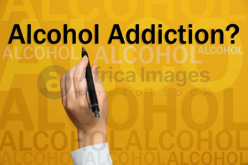 Alcohol addiction? - We can help you. Closeup view of woman with pen against yellow background