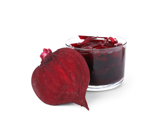 Pickled beets in glass bowl and half of vegetable isolated on white