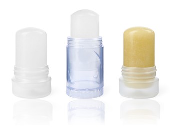 Image of Set with different natural crystal alum deodorants on white background