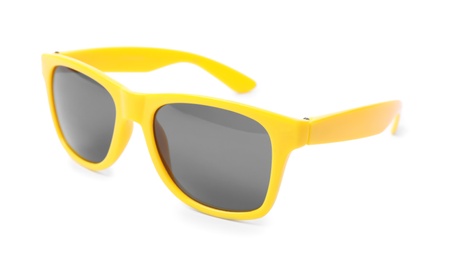 Beautiful sunglasses on white background. Beach object