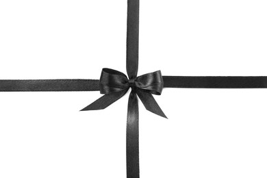 Elegant black ribbon with bow isolated on white, top view