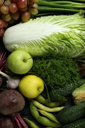 Photo of Different fresh ripe vegetables and fruits on table, flat lay. Farmer produce
