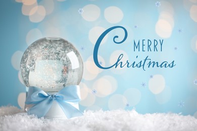 Merry Christmas. Beautiful snow globe against against blurred festive lights