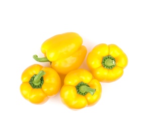 Ripe yellow bell peppers isolated on white, top view