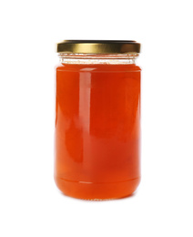 Glass jar with peach jam isolated on white. Pickling and preservation