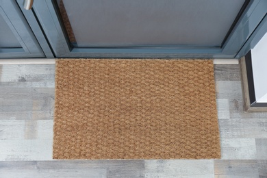 New clean mat near entrance door, top view