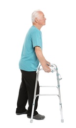 Full length portrait of elderly man using walking frame isolated on white