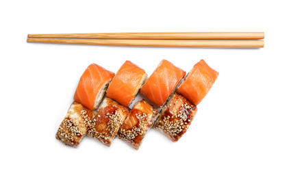 Set of delicious sushi rolls on white background, top view