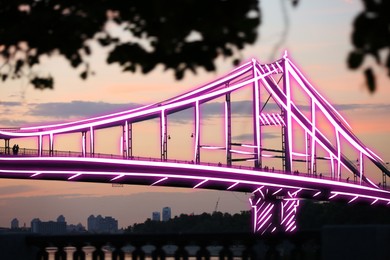 Image of Drawn bridge and blurred view of cityscape at sunset. Business cooperation concept
