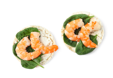 Puffed rice cakes with shrimps and basil isolated on white, top view