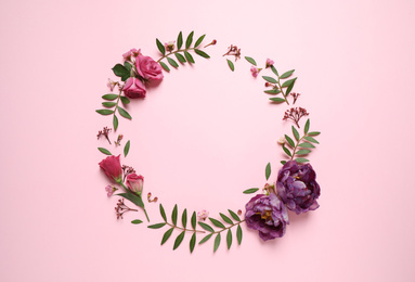 Frame made of beautiful flowers on pink background, flat lay with space for text. Floral composition