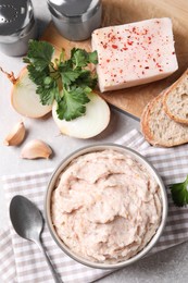 Photo of Delicious lard spread in bowl on table, flat lay