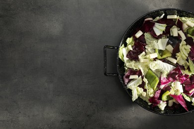 Delicious salad with Chinese cabbage, bell pepper and suluguni cheese on grey table, top view. Space for text