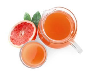 Tasty freshly made grapefruit juice and fruit on white background, top view