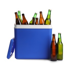 Blue plastic cool box with bottles isolated on white