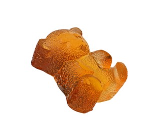 Delicious orange gummy bear candy isolated on white