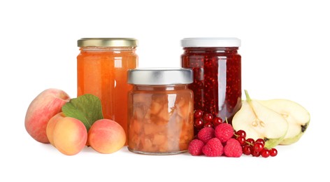 Photo of Jars with different jams and fresh fruits on white background