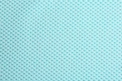 Textured light blue fabric as background, closeup