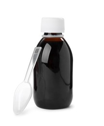 Bottle of syrup with plastic spoon on white background. Cough and cold medicine