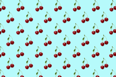 Pattern of cherries on pale light blue background