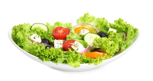 Tasty fresh Greek salad on white background