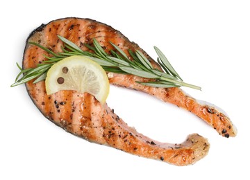 Tasty salmon steak with lemon and rosemary isolated on white, top view