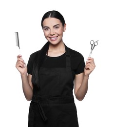 Portrait of happy hairdresser with professional scissors and comb on white background