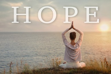Concept of hope. Woman meditating near sea, back view