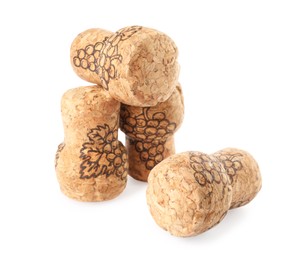 Sparkling wine corks with grape images on white background