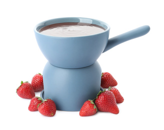 Fondue pot with chocolate and fresh strawberries isolated on white