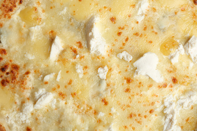 Photo of Delicious hot cheese pizza as background, closeup