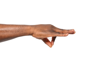 African-American man holding something in hand on white background, closeup