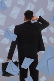 Image of Email spam. Confused man and many letters on color background