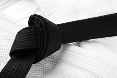 Martial arts uniform with black belt, closeup