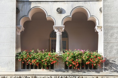 View of balcony with decorative elements and flowers