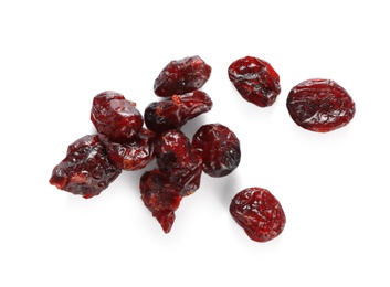 Many red dried cranberries on white background, top view