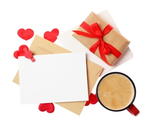 Blank card, gift box and cup of coffee on white background, top view. Valentine's Day celebration
