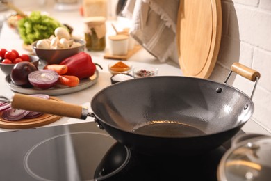 Frying pan with cooking oil on stove