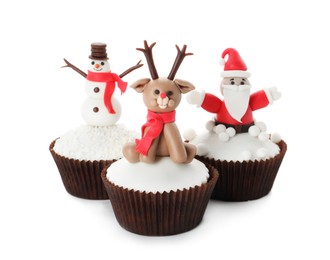 Beautiful Christmas cupcakes with Santa Claus, snowman and reindeer on white background