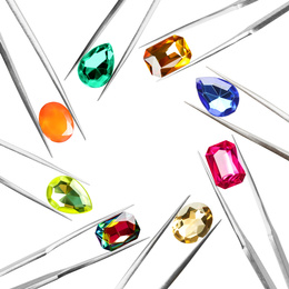 Frame of tweezers with different shiny gemstones on white background